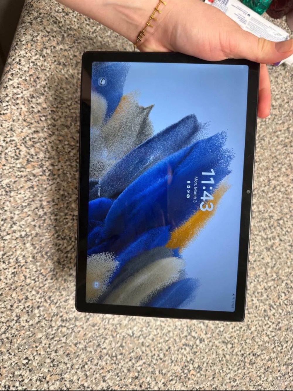 Samsung Tablet with Black Bezel and Blue Accent Display